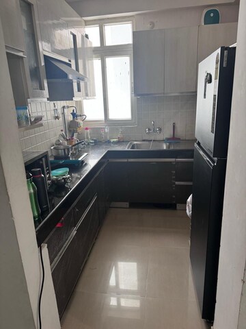 Kitchen in 3 BHK Apartment at Ramprastha City The Atrium, Sector 37d – for Rent