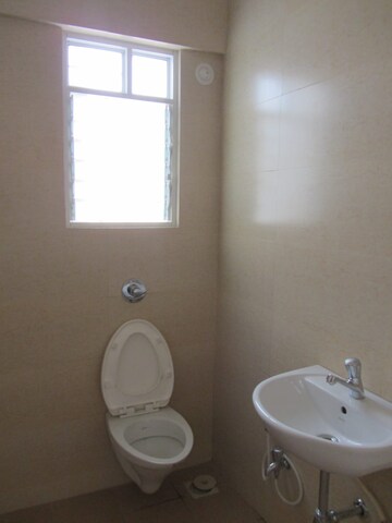 Bathroom in 2 BHK Apartment at Kishor Platinum Towers, Wakad – for Rent