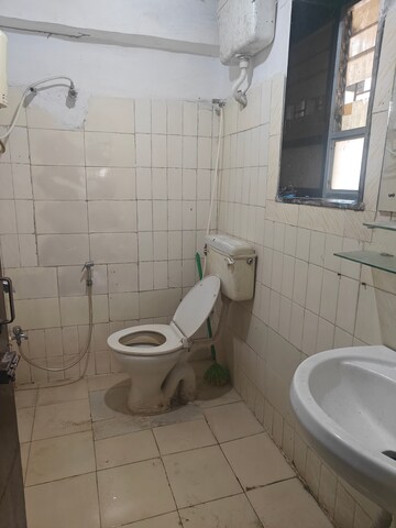 Bathroom in 2 BHK Apartment at Kendriya Vihar Seawoods, Seawoods West – for Rent