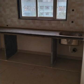 Kitchen in 1 BHK Apartment at Yesu Anand Residency, Kalyan Shilphata Road – for Sale