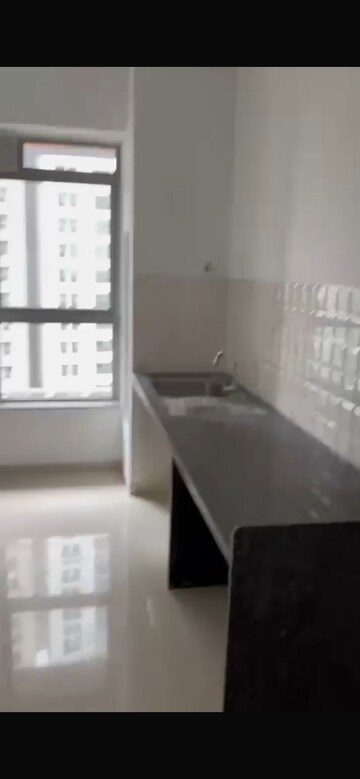 Kitchen in 1 BHK Apartment at Paradigm Zenith Pushpanjali Residency Phase III, Ghodbunder Road – for Sale
