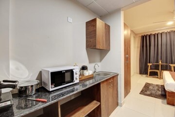 Kitchen in 2.5 BHK Apartment at Suncity Essel Tower, Sector 28 – for Rent