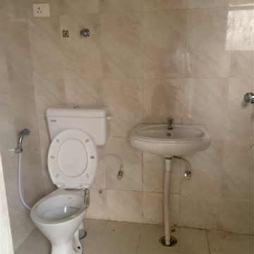 Bathroom in 2 BHK Apartment at Signature Global The Millennia, Garoli Kalan – for Rent