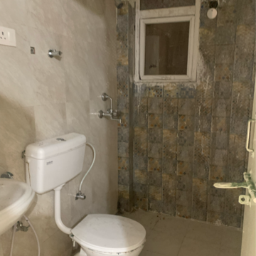 Bathroom in 2 BHK Apartment at Signature Global The Millennia, Garoli Kalan – for Rent