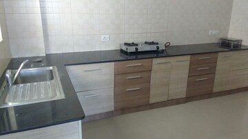 Kitchen in 2 BHK Apartment at G Corp Greens Apartment, Thergaon – for Rent