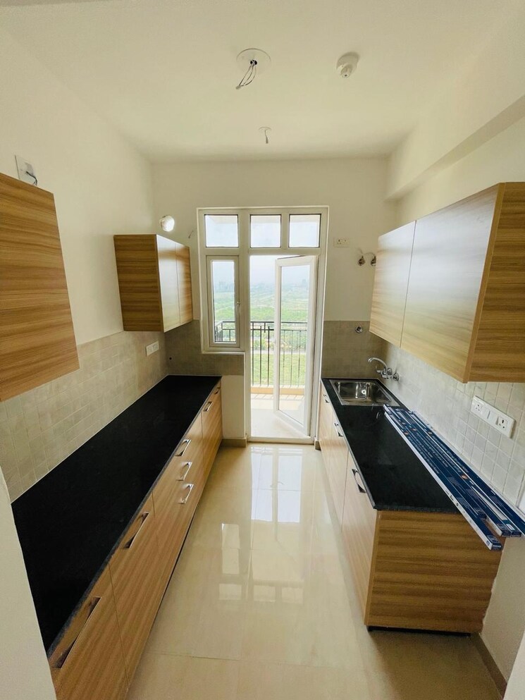 Kitchen, gulshan-bellina 2 Bedroom 663 Sq.Ft. Apartment In Sector 16 Greater Noida Greater Noida 9184212