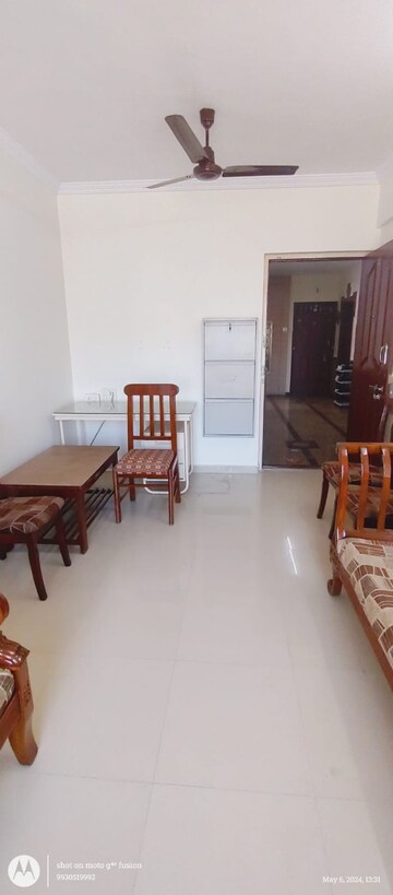 Living Room in 1 BHK Apartment at Puraniks Kavya Dhara CHS, Dhokali – for Rent