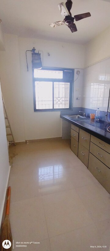 Kitchen in 1 BHK Apartment at Puraniks Kavya Dhara CHS, Dhokali – for Rent