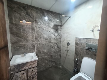 Bathroom in 3 BHK Builder Floor at Rps Palms, Sector 88 – for Sale