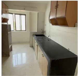 Kitchen in 3 BHK Apartment at Seven Bungalow, Andheri West – for Sale