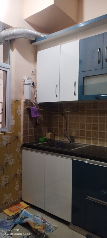 Kitchen in 2 BHK Apartment at Mahagun Mywoods, Sector 16c Greater Noida – for Rent