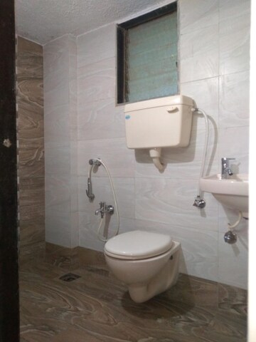 Bathroom in 1 BHK Apartment at Adiraj Status, Nalasopara West – for Rent