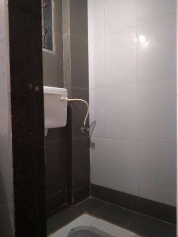 Bathroom in 1 BHK Apartment at Adiraj Status, Nalasopara West – for Rent