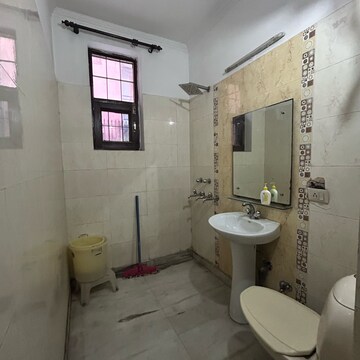 Bathroom in 2 BHK Builder Floor at Ansal Plaza Sector-23, Carterpuri Village – for Rent