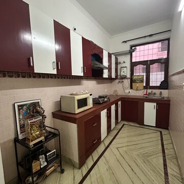 Kitchen in 2 BHK Builder Floor at Ansal Plaza Sector-23, Carterpuri Village – for Rent