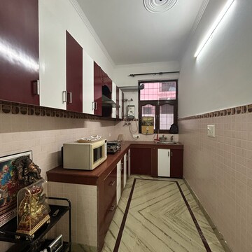 Kitchen in 2 BHK Builder Floor at Ansal Plaza Sector-23, Carterpuri Village – for Rent