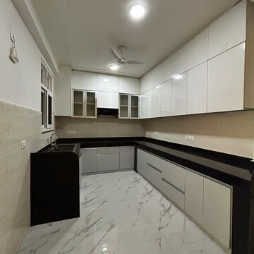 Kitchen in 3 BHK Builder Floor at Ansal Plaza Gurgaon, Carterpuri Village – for Rent