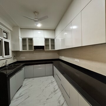 Kitchen in 3 BHK Builder Floor at Ansal Plaza Gurgaon, Carterpuri Village – for Rent