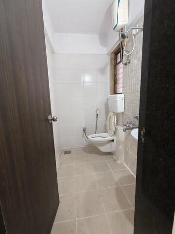 Bathroom in 1 BHK Apartment at Runwal Garden City, Balkum Pada – for Rent