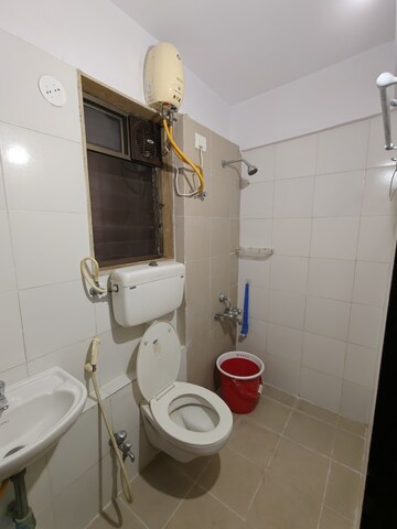Bathroom in 1 BHK Apartment at Runwal Garden City, Balkum Pada – for Rent