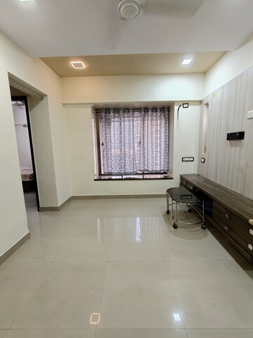 Living Room in 1 BHK Apartment at Runwal Garden City, Balkum Pada – for Rent
