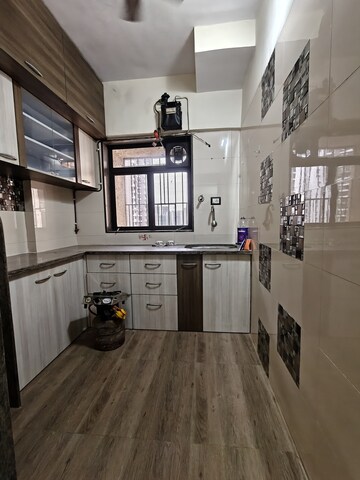 Kitchen in 1 BHK Apartment at Runwal Garden City, Balkum Pada – for Rent