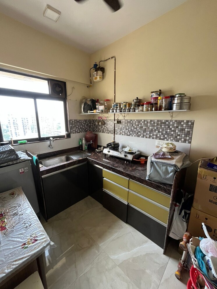 Kitchen, national-inner-circle-54 1 Bedroom 553 Sq.Ft. Apartment In Chembur Mumbai 9184608