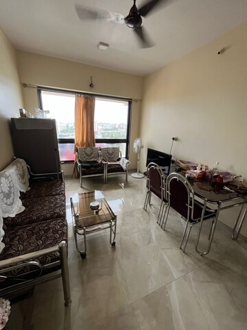 Living Room in 1 BHK Apartment at National Inner Circle 54, Chembur – for Sale