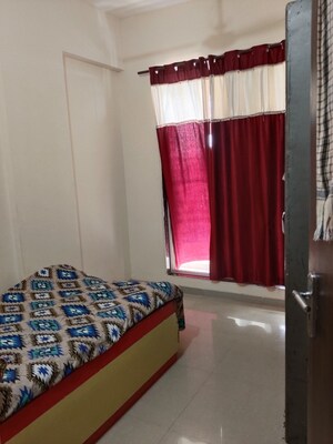 Bedroom in 2 BHK Apartment at Happy Home Sarvodaya Nagar, Ambernath West – for Sale
