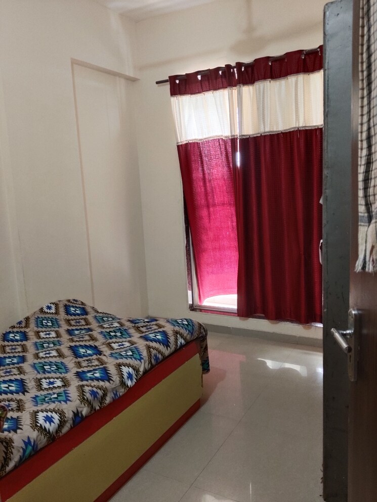 Bedroom, happy-home-sarvodaya-nagar 2 Bedroom 825 Sq.Ft. Apartment In Ambernath West Thane 9184813