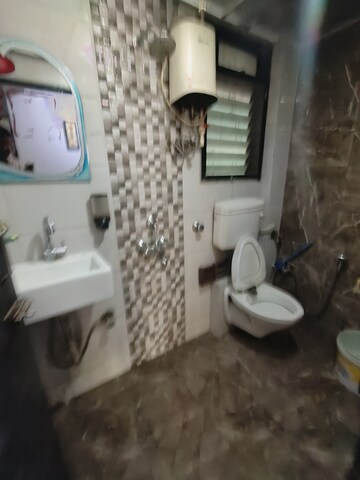 Bathroom in 2 BHK Apartment at Aashapura Crown City, Kalyan East – for Rent