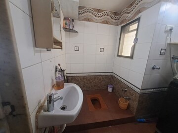 Bathroom in 1 BHK Apartment at Cosmos Habitat, Majiwada – for Rent