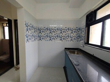 Kitchen in 2 BHK Apartment at Shiddivinayak Society, Vartak Nagar – for Sale