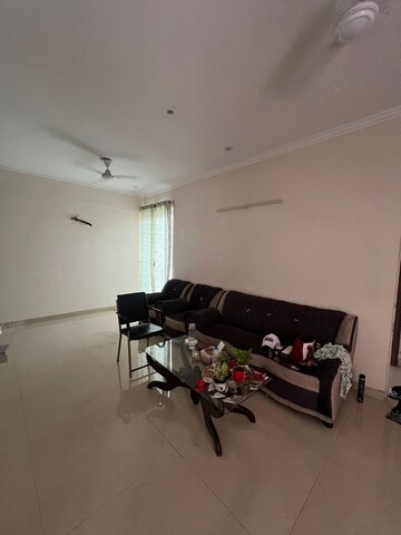 Living Room in 2 BHK Apartment at Affinity Greens, International Airport Road – for Rent