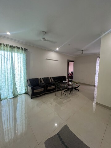 Living Room in 2 BHK Apartment at Affinity Greens, International Airport Road – for Rent