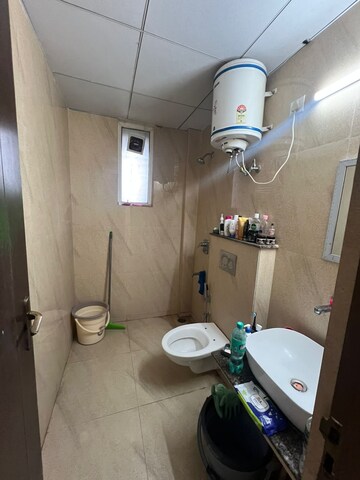 Bathroom in 2 BHK Apartment at Affinity Greens, International Airport Road – for Rent