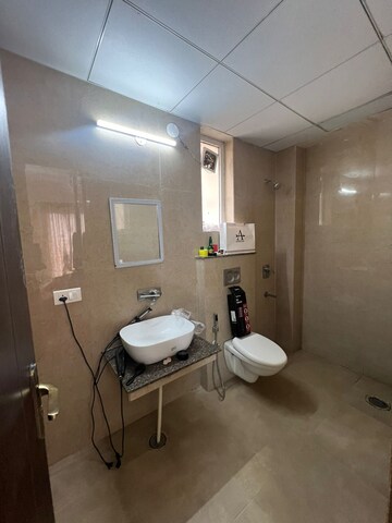 Bathroom in 2 BHK Apartment at Affinity Greens, International Airport Road – for Rent