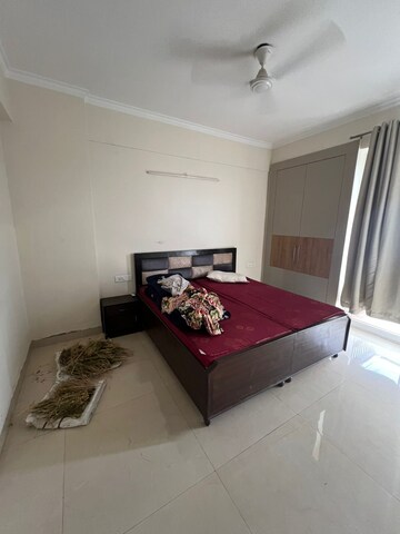 Bedroom in 2 BHK Apartment at Affinity Greens, International Airport Road – for Rent