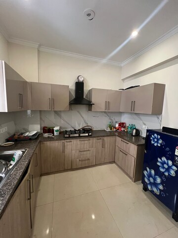 Kitchen in 2 BHK Apartment at Affinity Greens, International Airport Road – for Rent