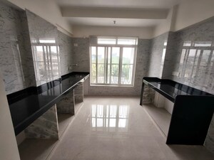 Kitchen in 3 BHK Apartment at Vijayraj Yashwant Niwas, Naupada – for Sale
