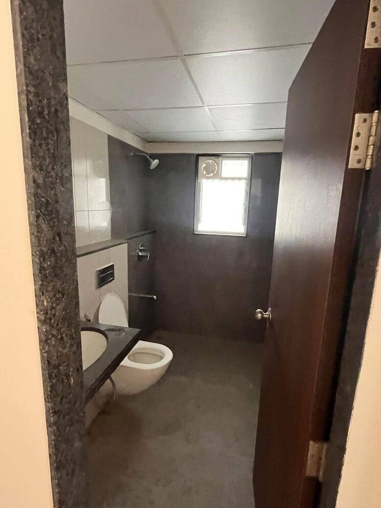 Bathroom, geras-world-of-joy-l 2 Bedroom 645 Sq.Ft. Apartment In Kharadi Pune 9184967
