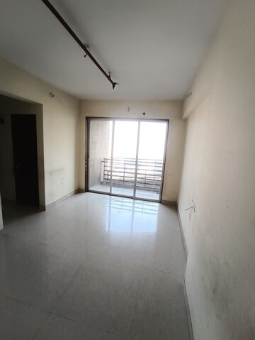 Living Room in 1 BHK Apartment at Ajmera New Era, Kalyan West – for Rent