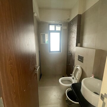Bathroom in 2 BHK Apartment at Kanakia Hollywood, Yari Road – for Rent