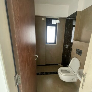 Bathroom in 2 BHK Apartment at Kanakia Hollywood, Yari Road – for Rent