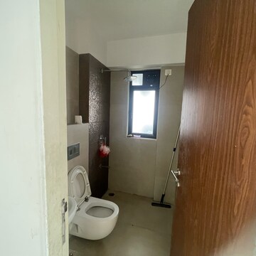 Bathroom in 2 BHK Apartment at Kanakia Hollywood, Yari Road – for Rent