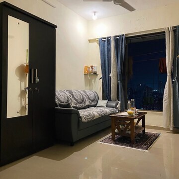 Living Room in 1 BHK Apartment at Uday CHS Goregaon, Unnat Nagar – for Rent