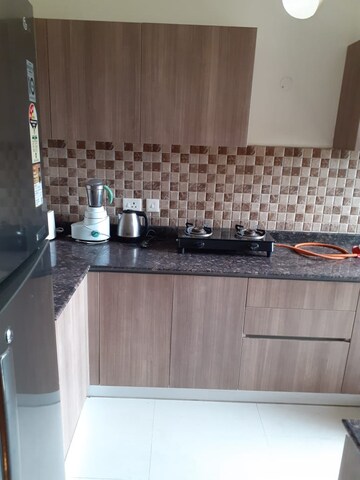 Kitchen in 3 BHK Apartment at Adani Oyster Greens, Sector 102 – for Rent