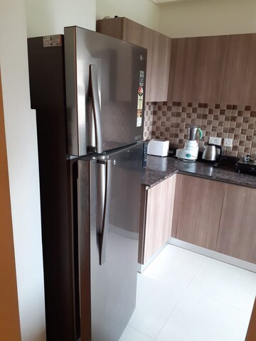 Kitchen in 3 BHK Apartment at Adani Oyster Greens, Sector 102 – for Rent