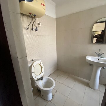 Bathroom in 2 BHK Apartment at Maya Garden City, Nagla Road – for Rent