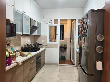 Kitchen in 3 BHK Apartment at Pashmina Waterfront, Old Madras Road – for Rent